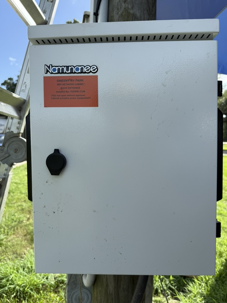 Closed outdoor network enclosure after installation.