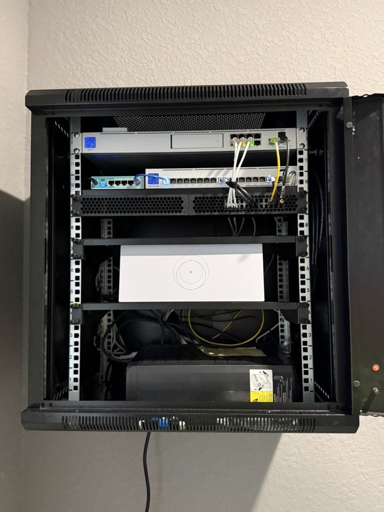 Open network headend rack with core switching and routing equipment.
